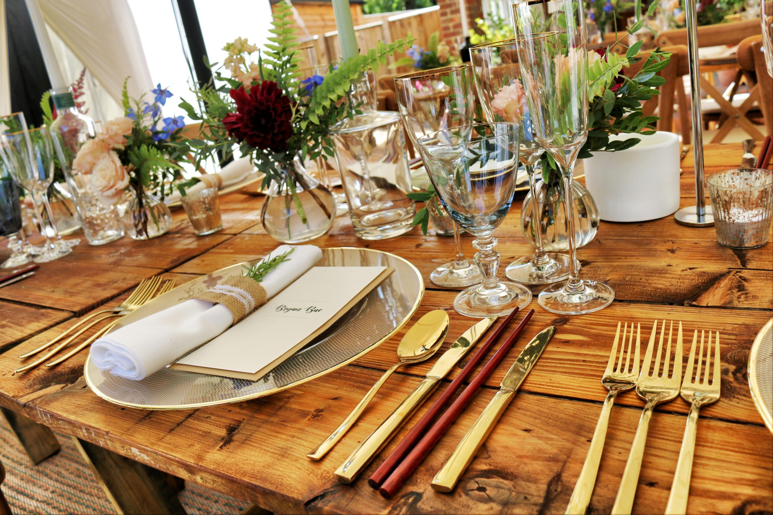 A fine dining table with elegant place settings, crisp linens, and polished silverware—symbolizing the polished front-end of a business that runs smoothly behind the scenes.